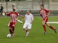Fotbalisté Velkých Pavlovic (v červeném) porazili v derby Lanžhot na jeho vlastním trávníku 3:1. Autor: DENÍK/Martin Daneš