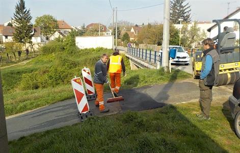 Služby města * Opravy komunikací